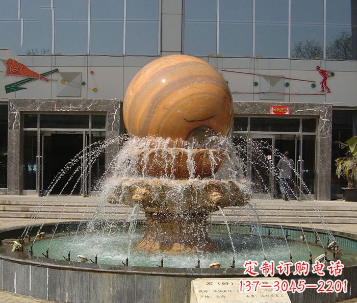 衢州石来运转球晚霞红风水球石雕